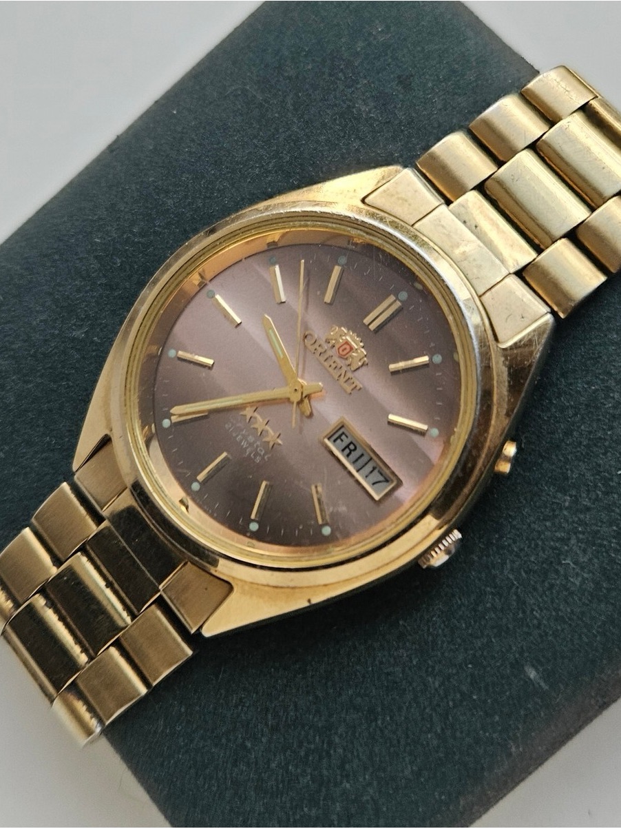 Vintage 1983 Orient Automatic Mens Gold Watch WDaydate  Gold Accents